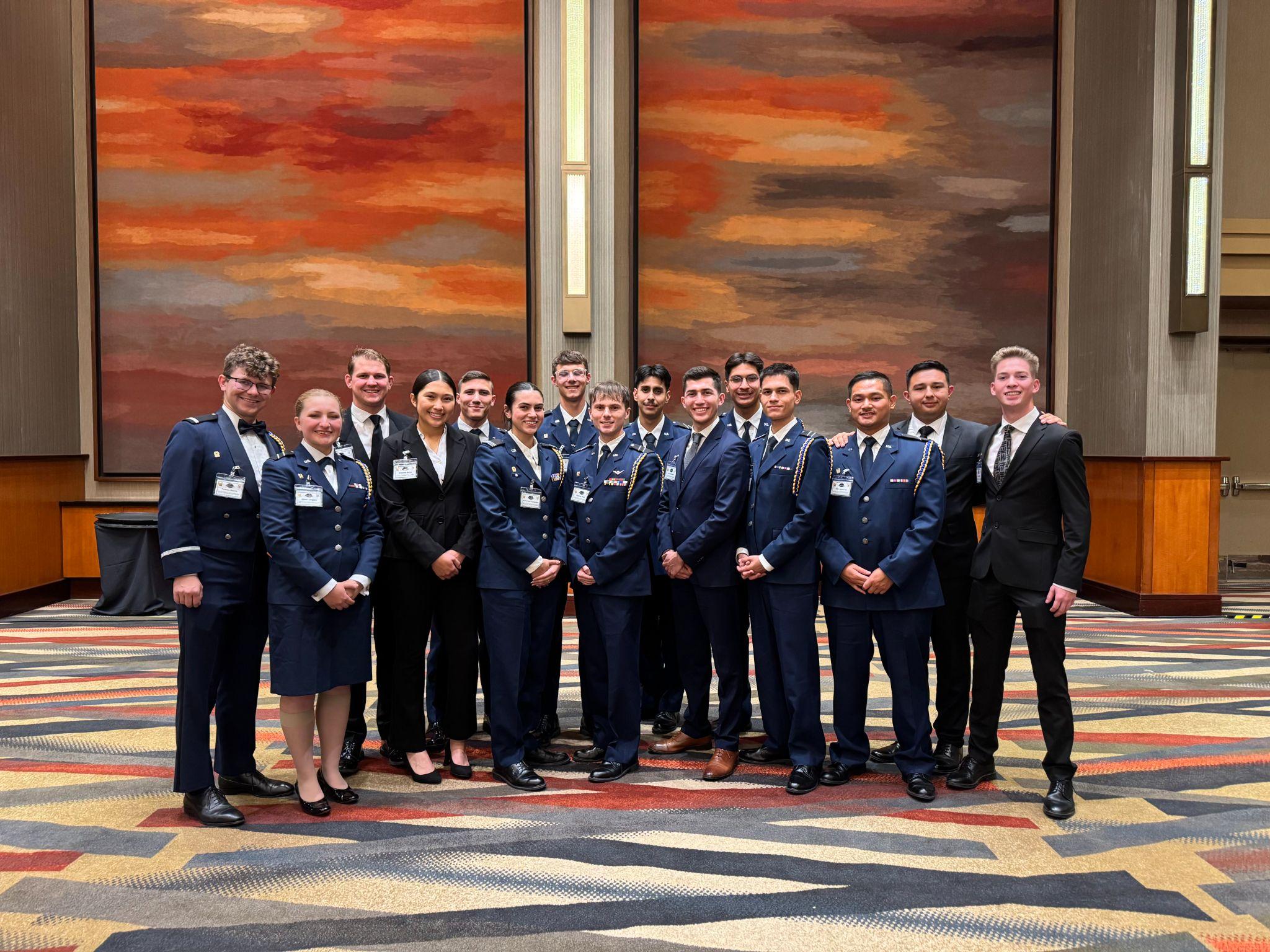 The sixteen cadets of the Risner Squadron national staff bid, in dress blues at National Conclave